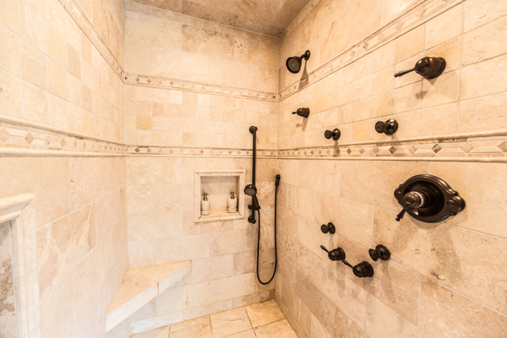 Elegant beige tile shower